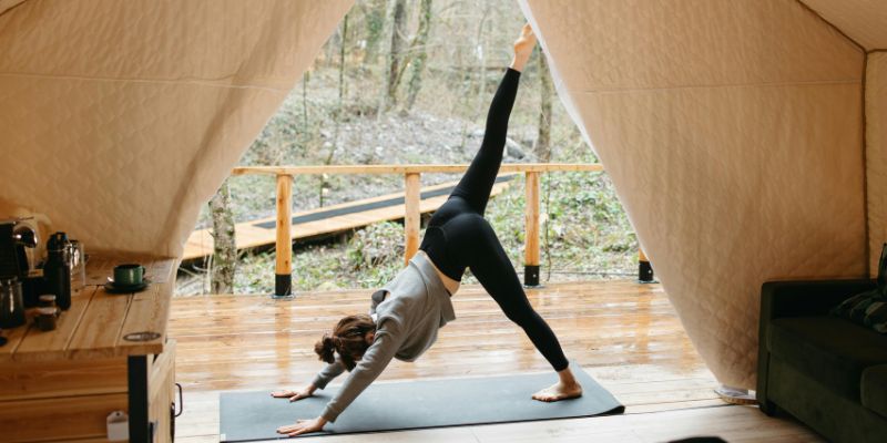 Woman in Activewear Doing Yoga