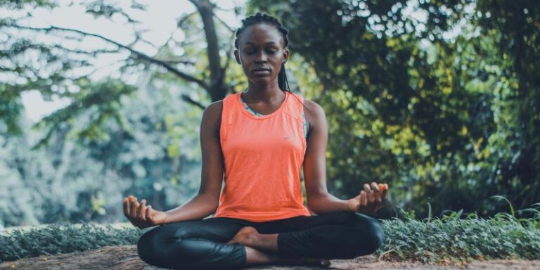 Yoga for Health - Woman Meditating in the Outdoors