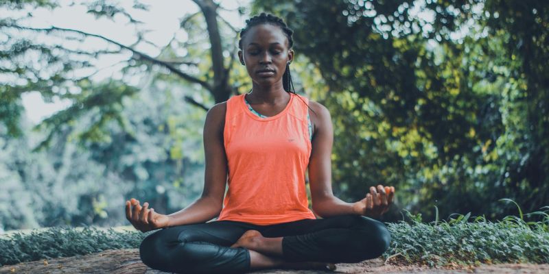 Yoga for Health - Woman Meditating in the Outdoors
