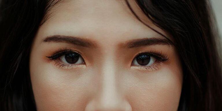 Eye Yoga - Close-Up Photography of a Woman
