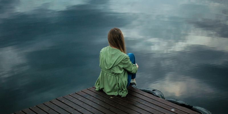 Get Your Life Together - Woman Sitting on Wooden Planks
