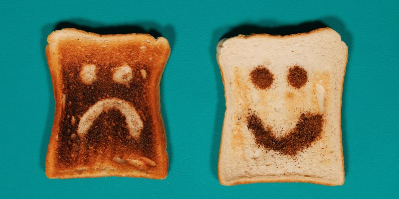 Improve Your Mood - Comparison of Toasts with Happy and Sad Faces