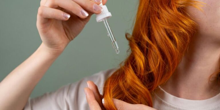 Rosemary Oil vs Minoxidil - Women Applying Hair Serum