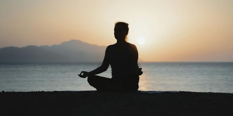 Dopamine Detox - Silhouette of Woman Doing Yoga on the Beach